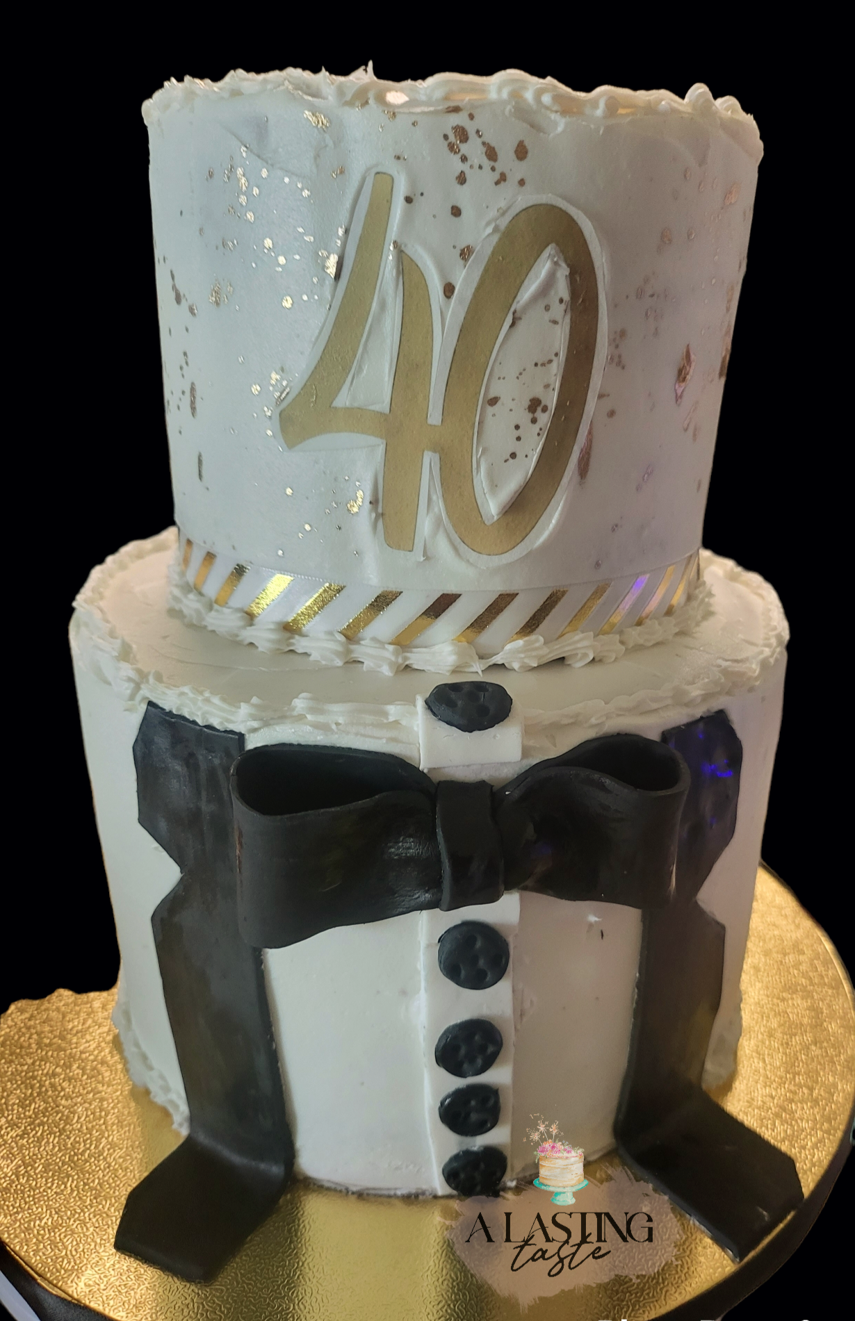 Black and gold themed cake for a special birthday. This is a double  barrelled red velvet cake measuring 8 inches tall, filled with 4 layers of  Swiss, By Anita's Cake Bakery
